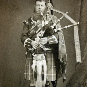 Scotsman playing the Bagpipes