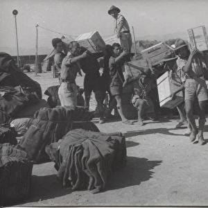Scouts unloading supplies after earthquake, Greece