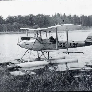 Print of a DH.60M Moth Seaplane in water, circa 1920s Print of a DH.60M Moth Seaplane in water, circa 1920s
