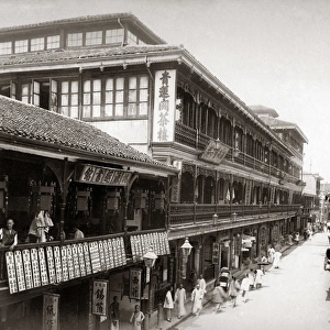 Shop fronts in the Chinese quarter, Shanghai, China, circa 1