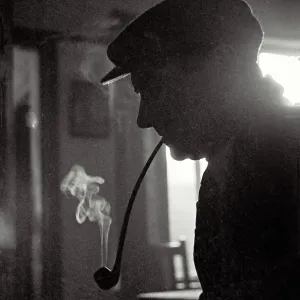 Print of a Middle-Aged Man Smoking a Long-Stemmed Pipe Print of a Middle-Aged Man Smoking a Long-Stemmed Pipe