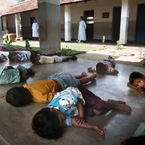 Small children take a nap during the afternoon, Sri Lanka
