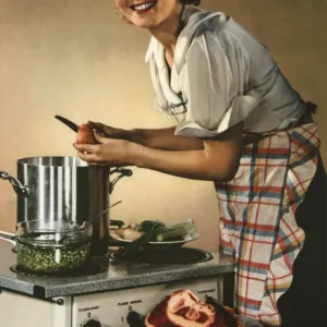 Smiling woman preparing a wholesome feast