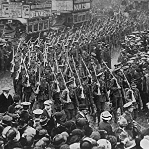 Soldiers marching along, Commercial Rd, London, WW1