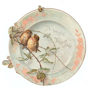 Two sparrows on a plate-shaped New Year card