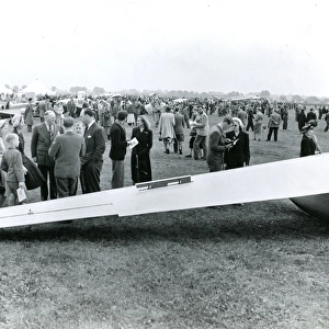 Spectators in front of the wing of a Sky Sailplane at th?