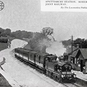 Spettisbury station with train under steam