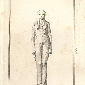 Statue of an Egyptian idol in diaphanous robe
