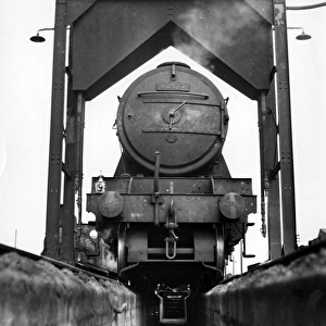 Steam locomotive above inspection pit, Cambridge