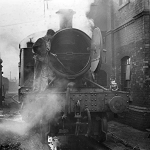 Steam locomotive being serviced, Exeter St David s