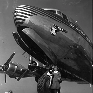 Stewardess Janet Pflug in front of a Douglas DC-4
