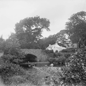A stone arched bridge and building, Glenballyemon, Cushendal