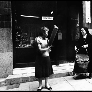 Street meeting with nun, Valencia, Spain