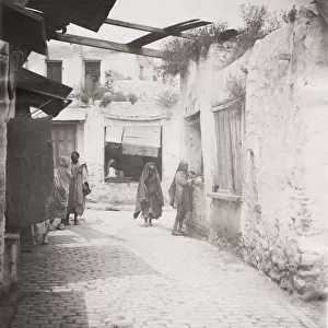 Back street in Tunis, Tunisia, people and architecture