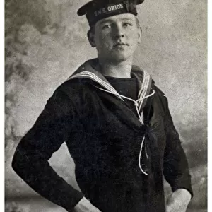 Studio photo, sailor in HMS Orion cap and uniform, WW1