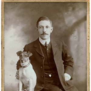 Studio portrait, man with Jack Russell terrier dog