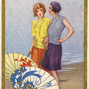 Two Stylish Belgian girls on the beach with Paper Umbrellas