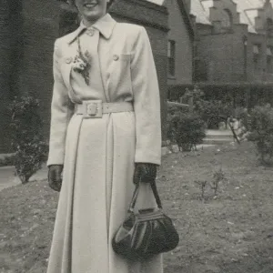 Stylish woman in an elegant coat and handbag Stylish woman in an elegant coat and handbag