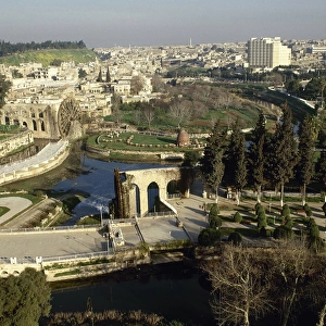 Syria. Hama. General view and the noria in the Orontes river