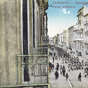 Taranto, Italy - Sailors march up the Corso Umberto