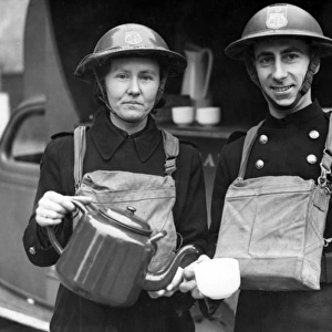 Tea break for AFS man and woman, London, WW2