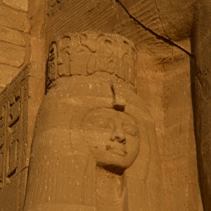 Temple of Ramses II. Nefertari. Statue near the feet of the