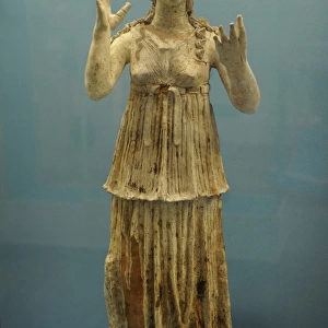 Terracotta figure of young woman. Tomb in Canosa, Apulia. 30
