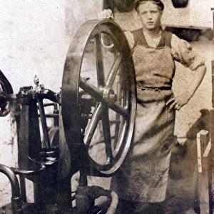 Textile Mill Worker and Machinery