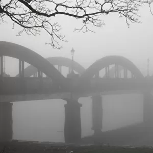 Thick fog on the concrete bridge over the River Dee