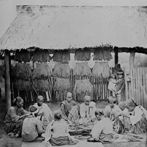 Tobacco drying and group of workers, Philippines