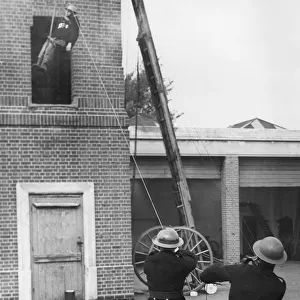 Trainee lowered from tower during exercise drill, WW2