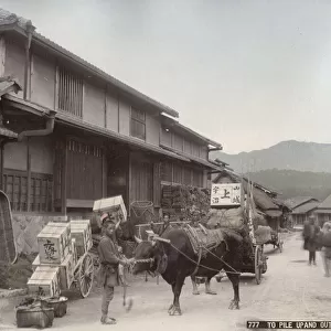 Transporting boxes of tea by ox cart, Japan