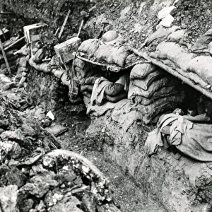 Trench scene with soldiers asleep in dugouts
