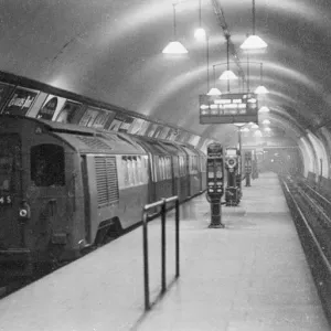 A tube a train at a london underground platform at Euston