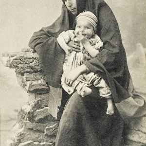 Turkish beggar woman with baby