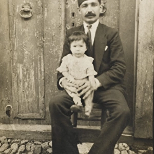 Turkish man and his young daughter