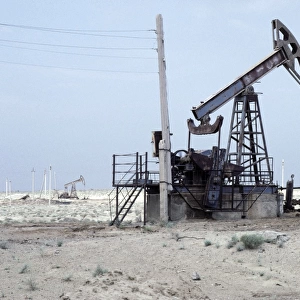 A typical oil-pump - oil-well in a desert