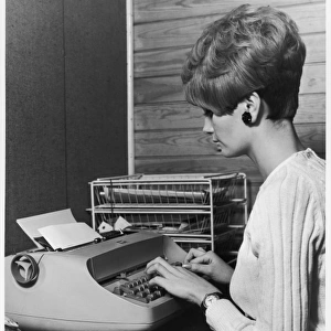 Typing a Letter / 1960S