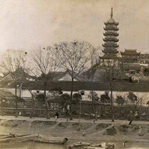 Unidentified Chinese Pagoda and riverside buildings