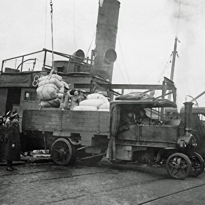Unloading flour from a ship for the Western Front, WW1