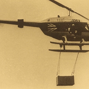Various helicopters lifting load