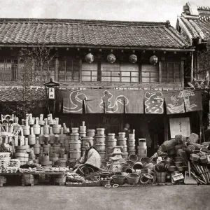 Vendor of pots and brooms, Japan, circa 1870s. Date: circa 1870s Vendor of pots and brooms, Japan, circa 1870s. Date: circa 1870s