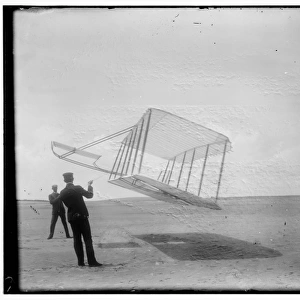 Side view of glider flying as a kite near the ground, Wilbur