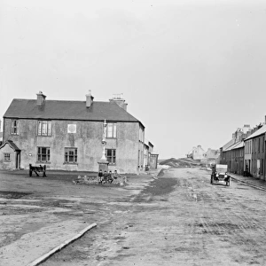 View of a village square, location unknown, perhaps Dunfanag