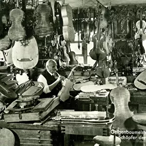 Violin and stringed musical instrument maker's workshop