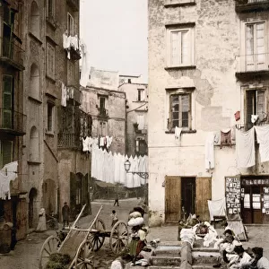 Washing clothes in the street, Naples, Italy