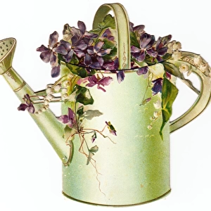 Watering can and flowers on a Victorian scrap