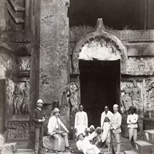 Westerners and native Indian men, temple, , India
