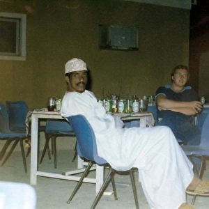 White men drinking in Oman