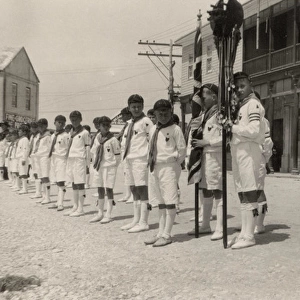 Wolf cubs waiting for scouts, church parade, Bermuda